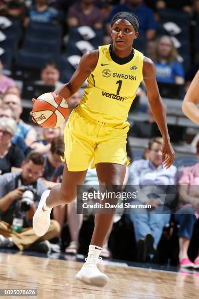 Crystal Langhorne of the Seattle Storm handles the ball during the game against the Minnesota Lynx on August 12, 2018 at Target Center in...