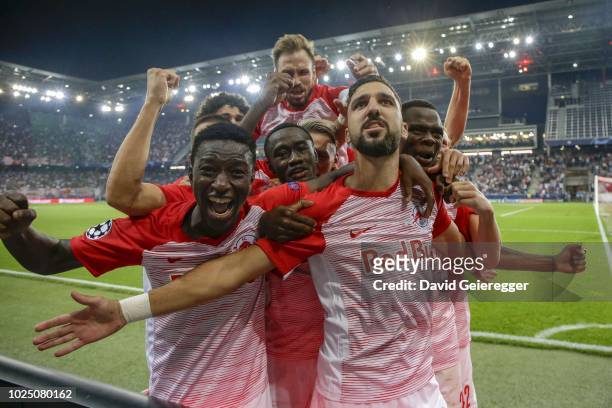 Munas Dabbur of Salzburg celebrates with his teammates after scoring the second goal during the UEFA Champions League match between FC Salzburg and...