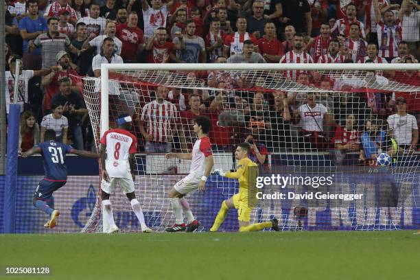 El Fardou Ben Nabouhane of Belgrade scores the first goal of his team during the UEFA Champions League match between FC Salzburg and Red Star...