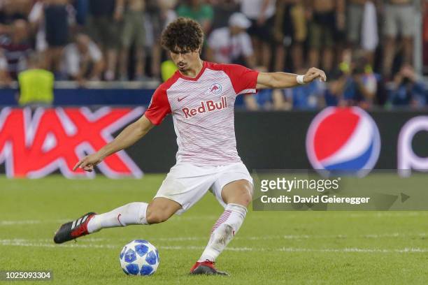 Andre Ramalho of Salzburg kicks the ball during the UEFA Champions League match between FC Salzburg and Red Star Belgrade at Red Bull Arena on August...