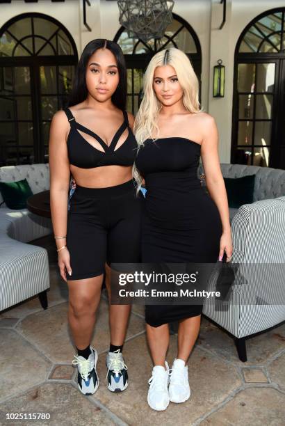 Jordyn Woods and Kylie Jenner attend the launch event of the activewear label SECNDNTURE by Jordyn Woods at a private residence on August 29, 2018 in...