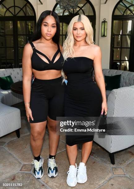 Jordyn Woods and Kylie Jenner attend the launch event of the activewear label SECNDNTURE by Jordyn Woods at a private residence on August 29, 2018 in...