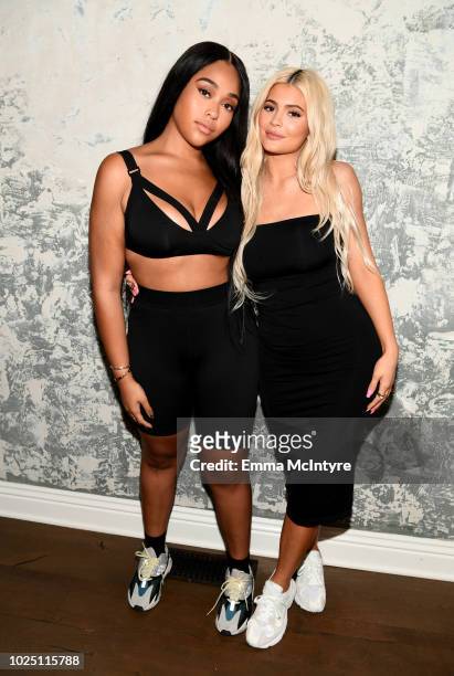 Jordyn Woods and Kylie Jenner attend the launch event of the activewear label SECNDNTURE by Jordyn Woods at a private residence on August 29, 2018 in...
