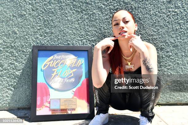 Singer Bhad Bhabie receives a gold record plaque for her song 'Gucci Flip Flops' at Los Angeles Recording Studio on August 29, 2018 in Los Angeles,...