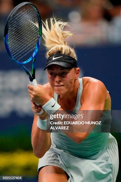 Carina Witthoeft of Germany serves to Serena Williams of the US during Day 3 of the 2018 US Open Women's Singles match at the USTA Billie Jean King...