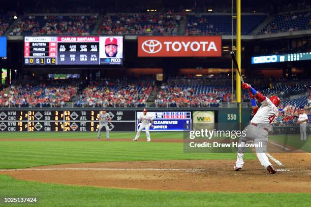 Carlos Santana of the Philadelphia Phillies hits a four run home run in the fifth inning against the Washington Nationals at Citizens Bank Park on...