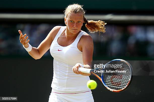 Petra Kvitova of Czech Republic plays a shot during her Quarter Final match against Kaia Kanepi of Estoniaon Day Eight of the Wimbledon Lawn Tennis...