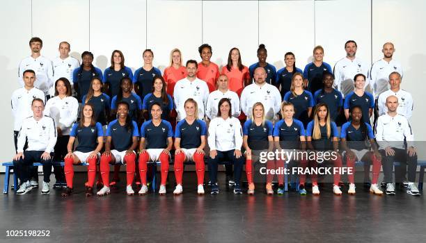 France's national football team pose for an official picture on August 29, 2018 in Clairefontaine-en-Yvelines France's press officer Jérôme Millagou,...