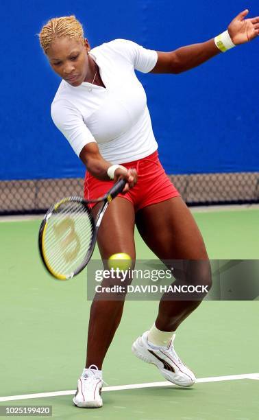 World number six Serena Williams of the United States practises on the opening day of the Sydney International tennis tournament, 06 January 2002....