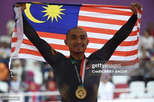 Awang Splinter Gold medallist Malaysia's Mohd Azizulhasni Awang celebrates during ...