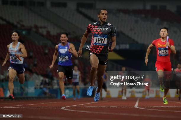 Aska Cambridge of Japan wins the final of the men's 4x100m relay athletics event on day twelve of the Asian Games on August 30, 2018 in Jakarta,...