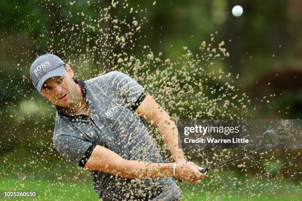 Martin Kaymer of Germany plays his shot out of the 10th green side bunker during day one of the Made in Denmark played at the Silkeborg Ry Golf Club...