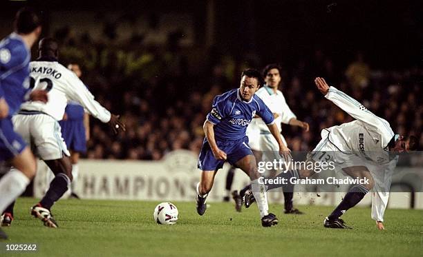 Dennis Wise of Chelsea goes past Jerome Leroy of Marseille during the UEFA Champions League group D match at Stamford Bridge in London. Chelsea won...