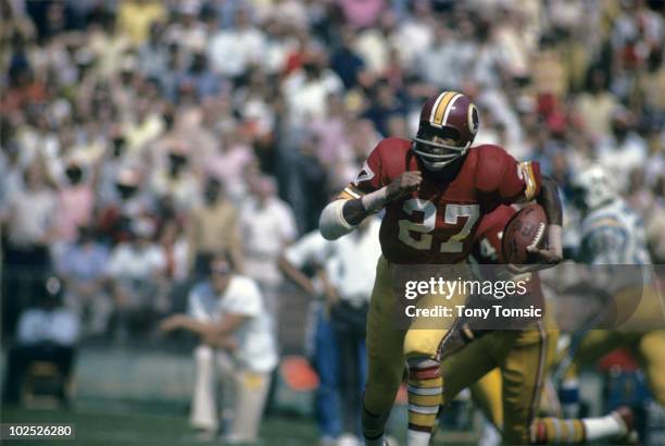 Defensive back Ken Houston of the Washington Redskins runs with ball during a game on September 16, 1973 against the San Diego Chargers at RFK...