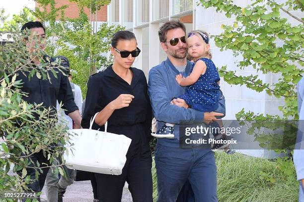 Bradley Cooper, Irina Shayk and their daughter Lea are seen arriving at the 75th Venice Film Festival on August 30, 2018 in Venice, Italy.