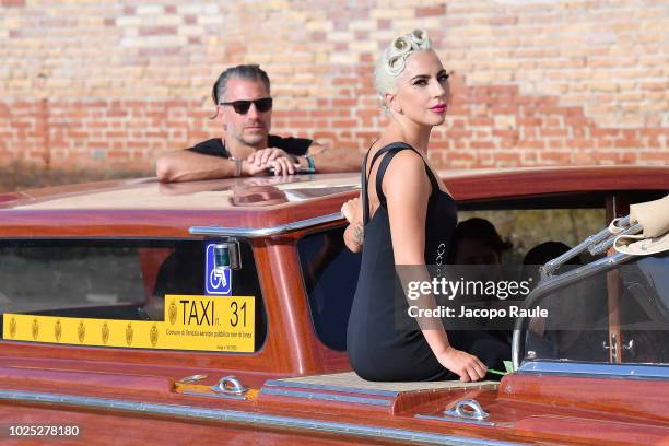 Lady Gaga and Christian Carino are seen during the 75th Venice Film Festival on August 30, 2018 in Venice, Italy.