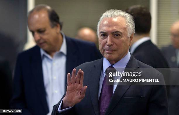 Brazilian President Michel Temer attends a meeting to follow the development of the Federal Security intervention of Rio de Janeiro state, at Duque...