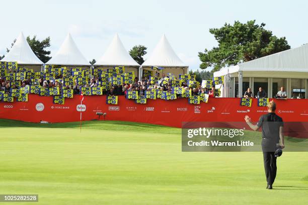 Robert Karlsson of Sweden arrives on the 18th green to a crowd recognition to his 600th appearence on tour during day one of the Made in Denmark...