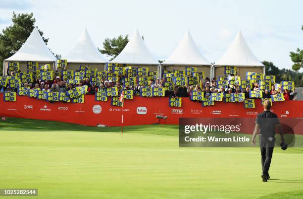 Robert Karlsson of Sweden arrives on the 18th green to a crowd recognition to his 600th appearence on tour during day one of the Made in Denmark...