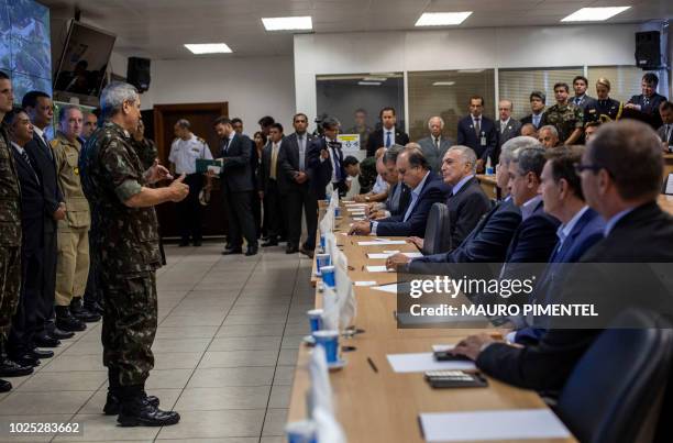 Rio de Janeiro's Security Federal Intervention General Walter Souza Braga Netto talks during a meeting to inform the development of the Federal...