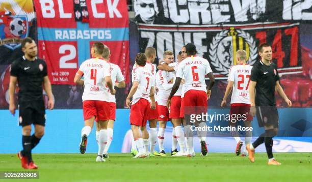 Matheus Cunha of Leipzig celebrates her team's first goal with team mates during the UEFA Europa League Qualifying Play-Off second leg match between...