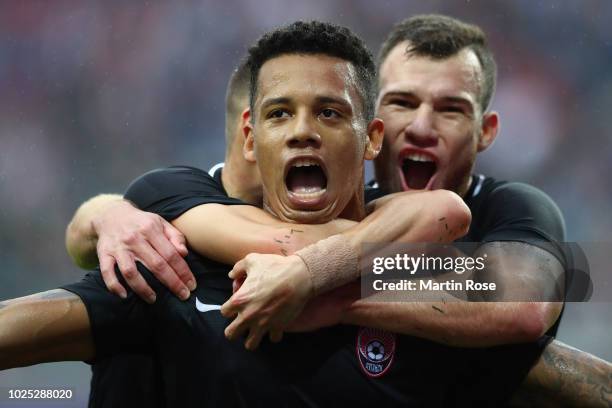 Rafael Ratao of Zorya celebrates her team's first goal during the UEFA Europa League Qualifying Play-Off second leg match between RB Leipzig and...