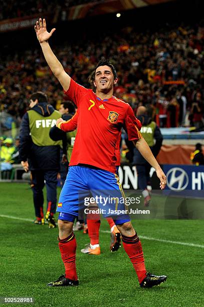 David Villa of Spain celebrates scoring the opening goal during the 2010 FIFA World Cup South Africa Round of Sixteen match between Spain and...