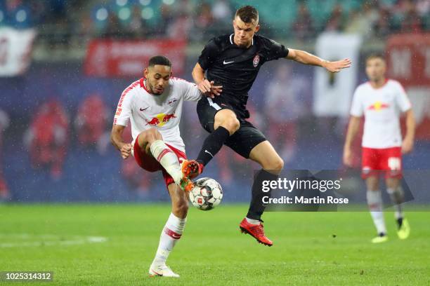 Matheus Cunha of Leipzig is challenged by Vladyslav Kochergin of Zorya during the UEFA Europa League Qualifying Play-Off second leg match between RB...