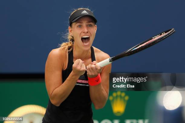 Angelique Kerber of Germany celebrates winning her women's singles second round match against Johanna Larsson of Sweden on Day Four of the 2018 US...