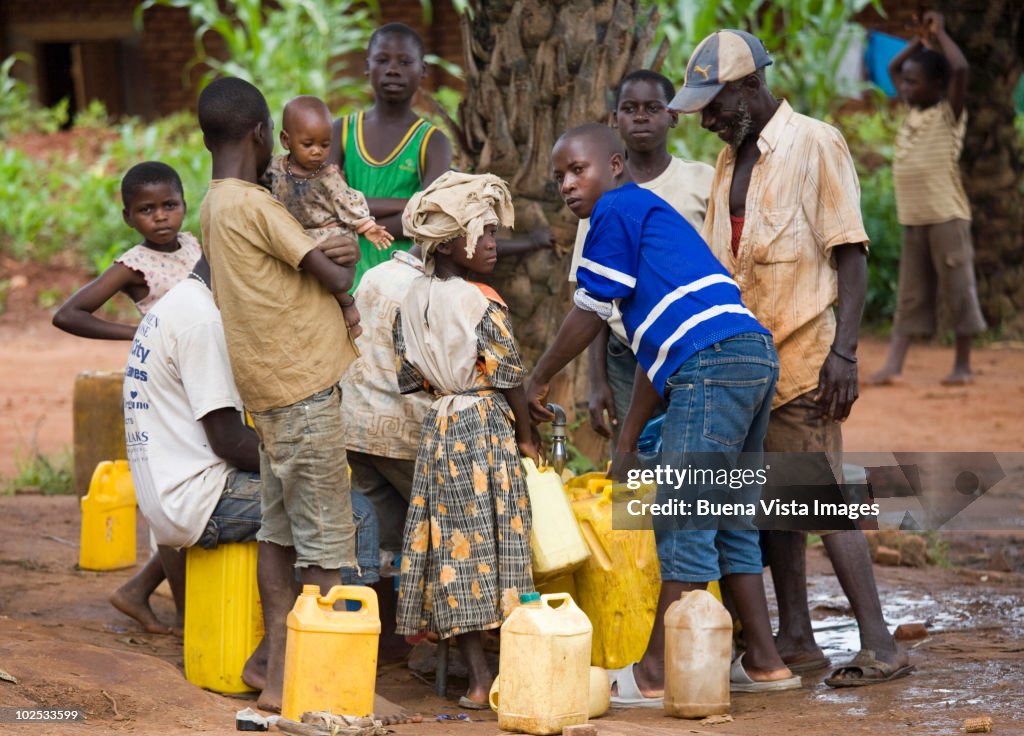 African people getting water at a well