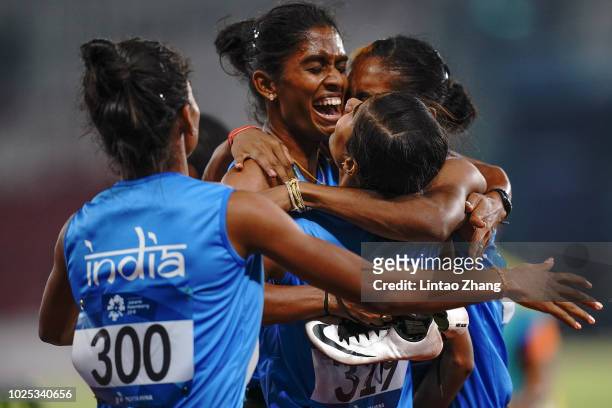 Gold medalist team of India celebrate after win the women's 4x400m relay on day twelve of the Asian Games on August 30, 2018 in Jakarta, Indonesia.