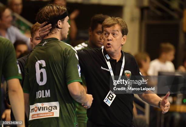 Jacob Tandrup Holm and coach Velimir Petkovic of Fuechse Berlin during the game between Fuechse Berlin and GWD Minden at the Max-Schmeling-Halle on...