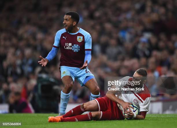 Aaron Lennon of Burnley shows his frustration as Kostas Fortounis of Olympiakos shields the ball during the UEFA Europa League qualifing second leg...