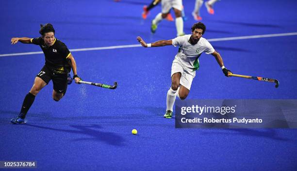 Kentaro Fukuda of Japan shoots during the Men's Hockey Semifinals match between Japan and Pakistan on day twelve of the Asian Games on August 30,...