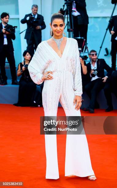 Ana Beatriz Barros walks the red carpet ahead of the 'Roma' screening during the 75th Venice Film Festival, in Venice, Italy, on August 30, 2018.