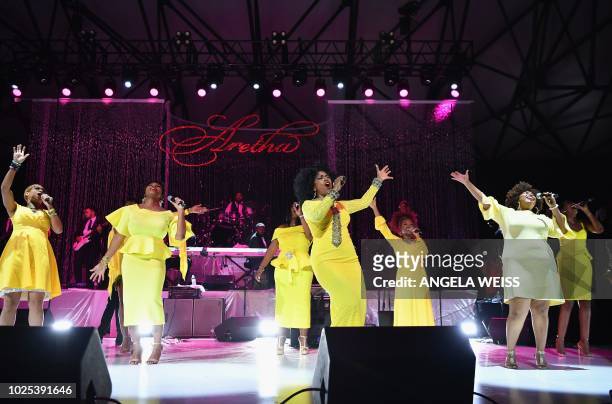 Singers perform during "A People's Tribute to the Queen", an Aretha Franklin tribute event at Chene Park amphitheatre on August 30, 2018 in Detroit,...