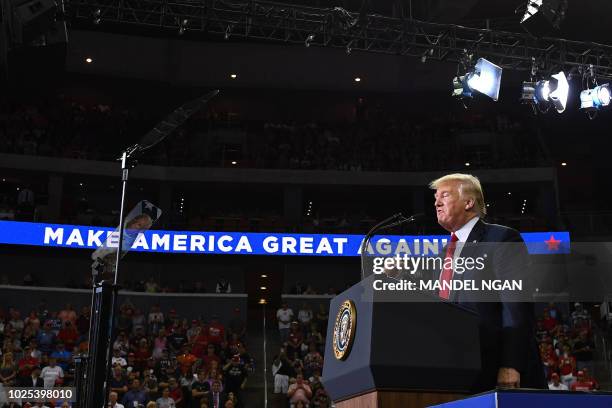 President Donald Trump speaks during a campaign rally at Ford Center in Evansville, Indiana on August 30, 2018.