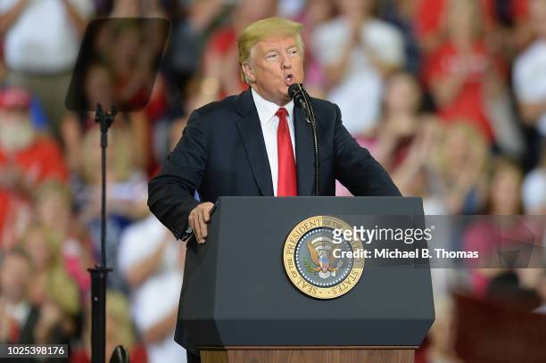 President Donald Trump delivers remarks at a campaign rally at the Ford Center on August 30, 2018 in Evansville, Indiana. The president was in town...