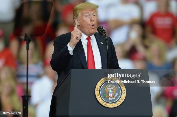 President Donald Trump delivers remarks at a campaign rally at the Ford Center on August 30, 2018 in Evansville, Indiana. The president was in town...