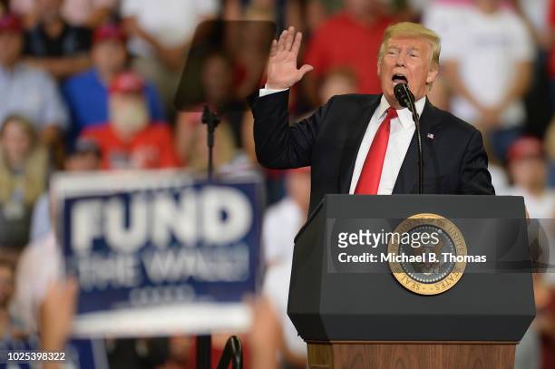 President Donald Trump delivers remarks at a campaign rally at the Ford Center on August 30, 2018 in Evansville, Indiana. The president was in town...