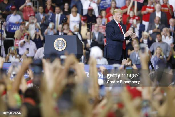 President Donald Trump applauds during a rally in Evansville, Indiana, U.S., on Thursday, Aug. 30, 2018. President Donald Trump wants to move ahead...