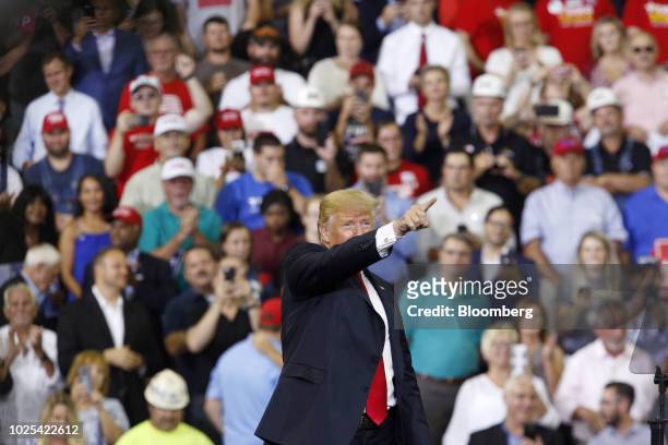 President Donald Trump gestures during a rally in Evansville, Indiana, U.S., on Thursday, Aug. 30, 2018. Trump wants to move ahead with a plan to...