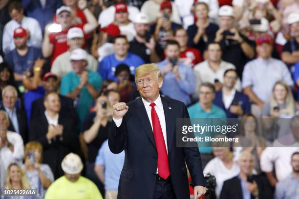 President Donald Trump gestures during a rally in Evansville, Indiana, U.S., on Thursday, Aug. 30, 2018. Trump wants to move ahead with a plan to...
