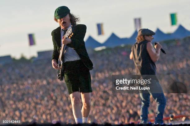 View from behind the stage of Angus Young and Brian Johnson of AC/DC performing on the first day of the Download Festival at Donington Park on June...