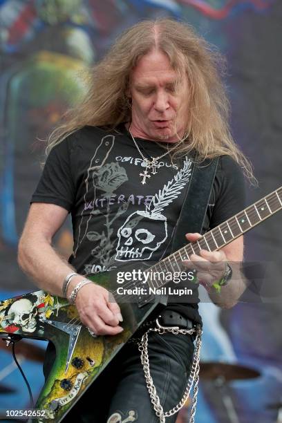 Doug Scarratt of Saxon performs on stage on the last day of the Download Festival at Donington Park on June 13, 2010 in Castle Donington, England.