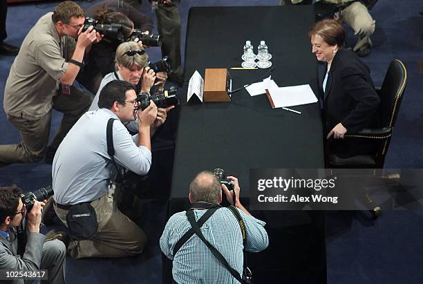 Supreme Court nominee Elena Kagan takes her seat as she returns to the third day of her confirmation hearings before the Senate Judiciary Committee...