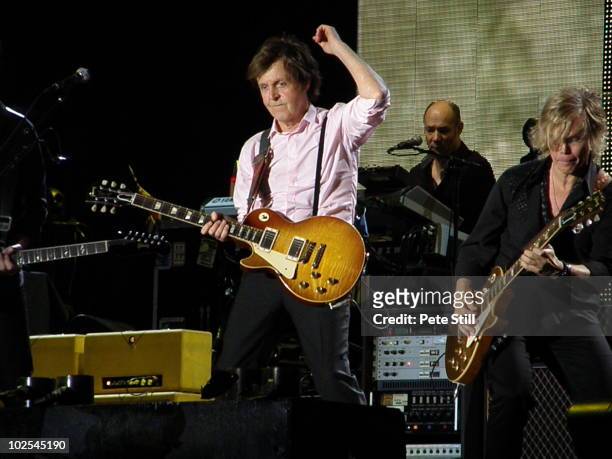 Rusty Anderson, Paul 'Wix' Wickens, Paul McCartney and Brian Ray perform on stage on the last day of Hard Rock Calling 2010 at Hyde Park on June 27,...