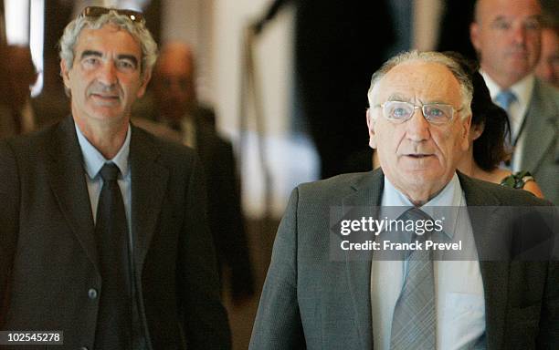 France national team coach Raymond Domenech and ex-French Football Federation president Jean-Pierre Escalettes arrive for a hearing in front of the...