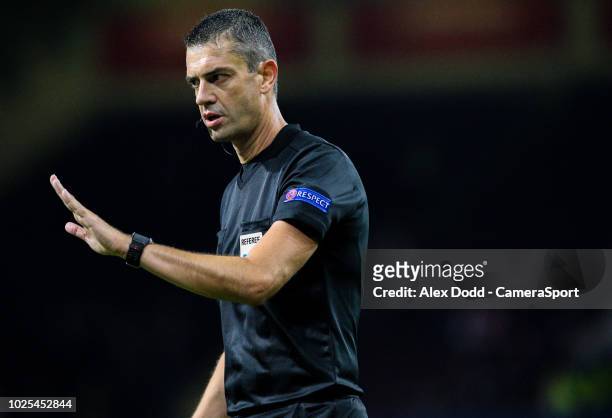 Referee Viktor Kassai during the UEFA Europa League Qualifying Second Leg match between Burnley and Olympiakos at Turf Moor on August 30, 2018 in...