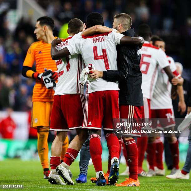 Olympiakos players celebrate after the final whistle during the UEFA Europa League Qualifying Second Leg match between Burnley and Olympiakos at Turf...